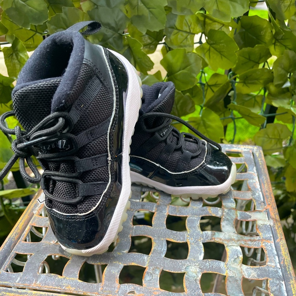 Baby/toddler Jordan 11 retro size 7C. Previously loved. See pics for details.